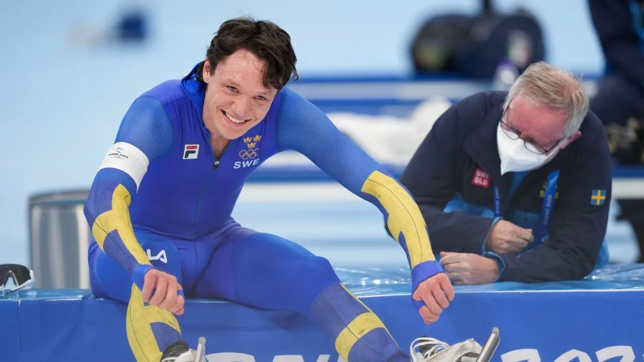 Nils van der Poel smiling trackside at the 2022 Beijing Olympics