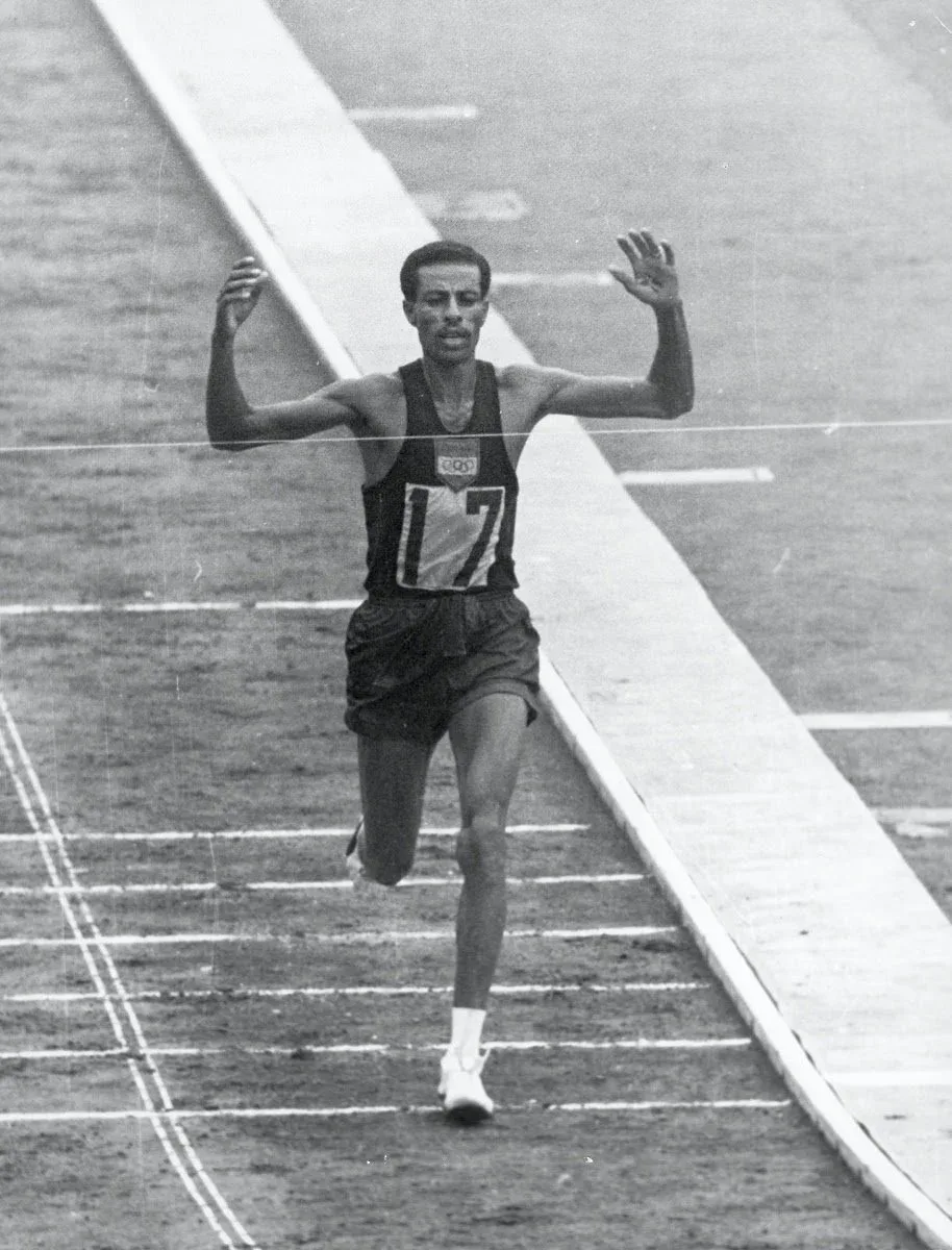 Abebe Bikila running the marathon at the 1964 Tokyo Olympics